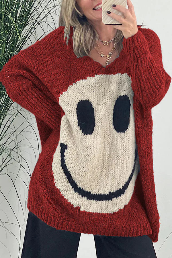 Vicky® | Confidence is everything. Long-sleeved knitted sweater with a smiley face