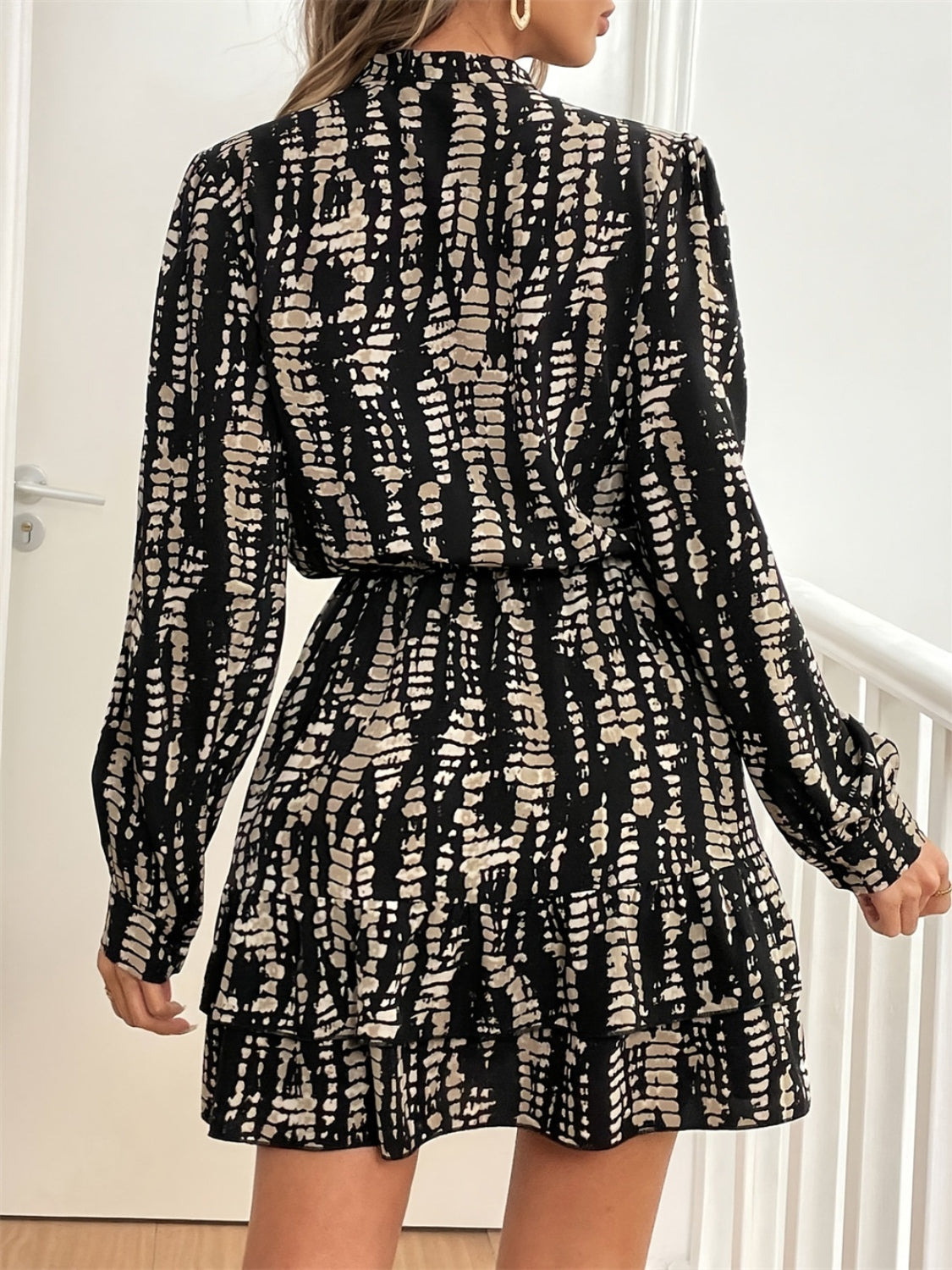 Stella® | Printed long sleeve mini dress