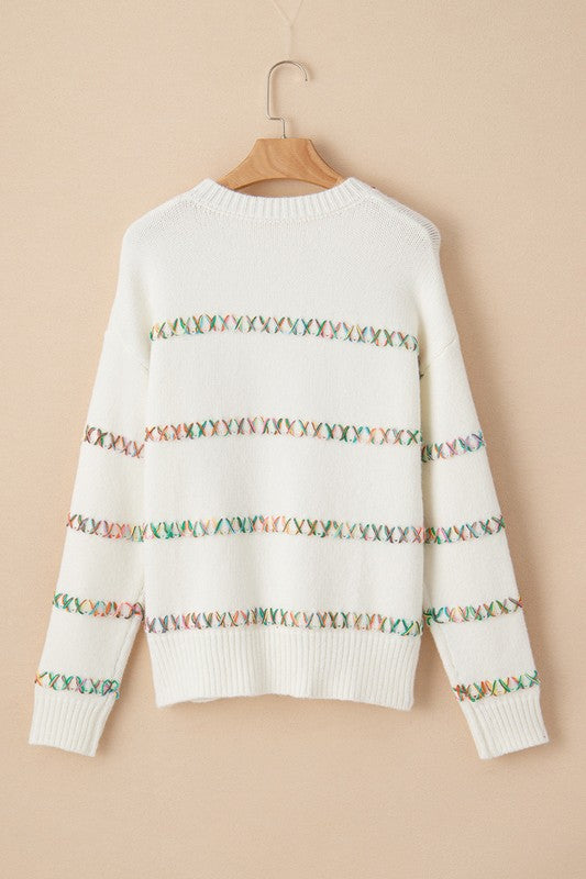 Tatiana® | White sweater with crossed seams and dropped shoulders