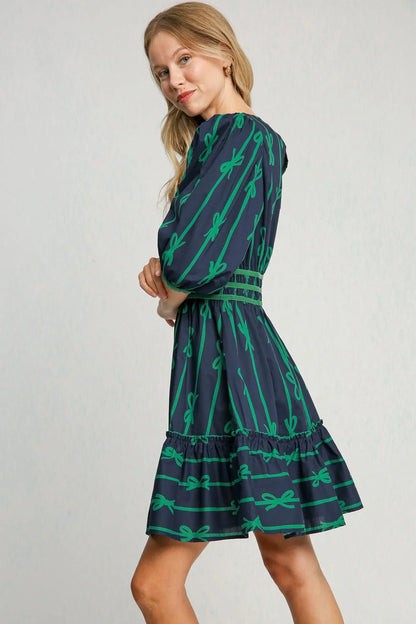 Sybil® | Stylish dress with green bow pattern