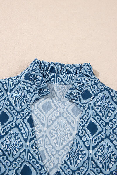 Perla® | Ruffled blouse with geometric print and notches