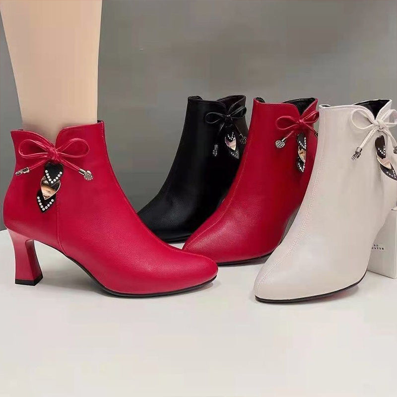 Zenaida® | Suede ankle boots with bow