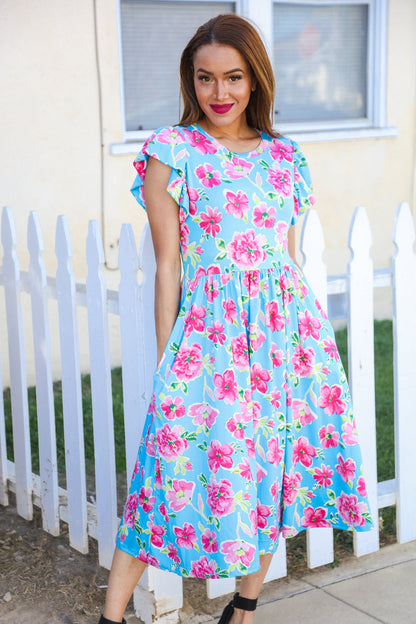 Philippa® | Feeling Femme Sky blue midi dress with a large floral pattern and pleated ruffle sleeves