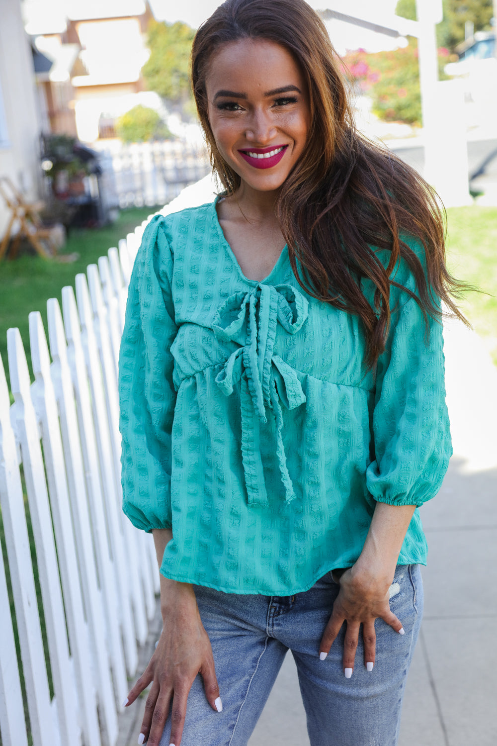 Tilly® | Mint woven babydoll blouse with bow and V-neck