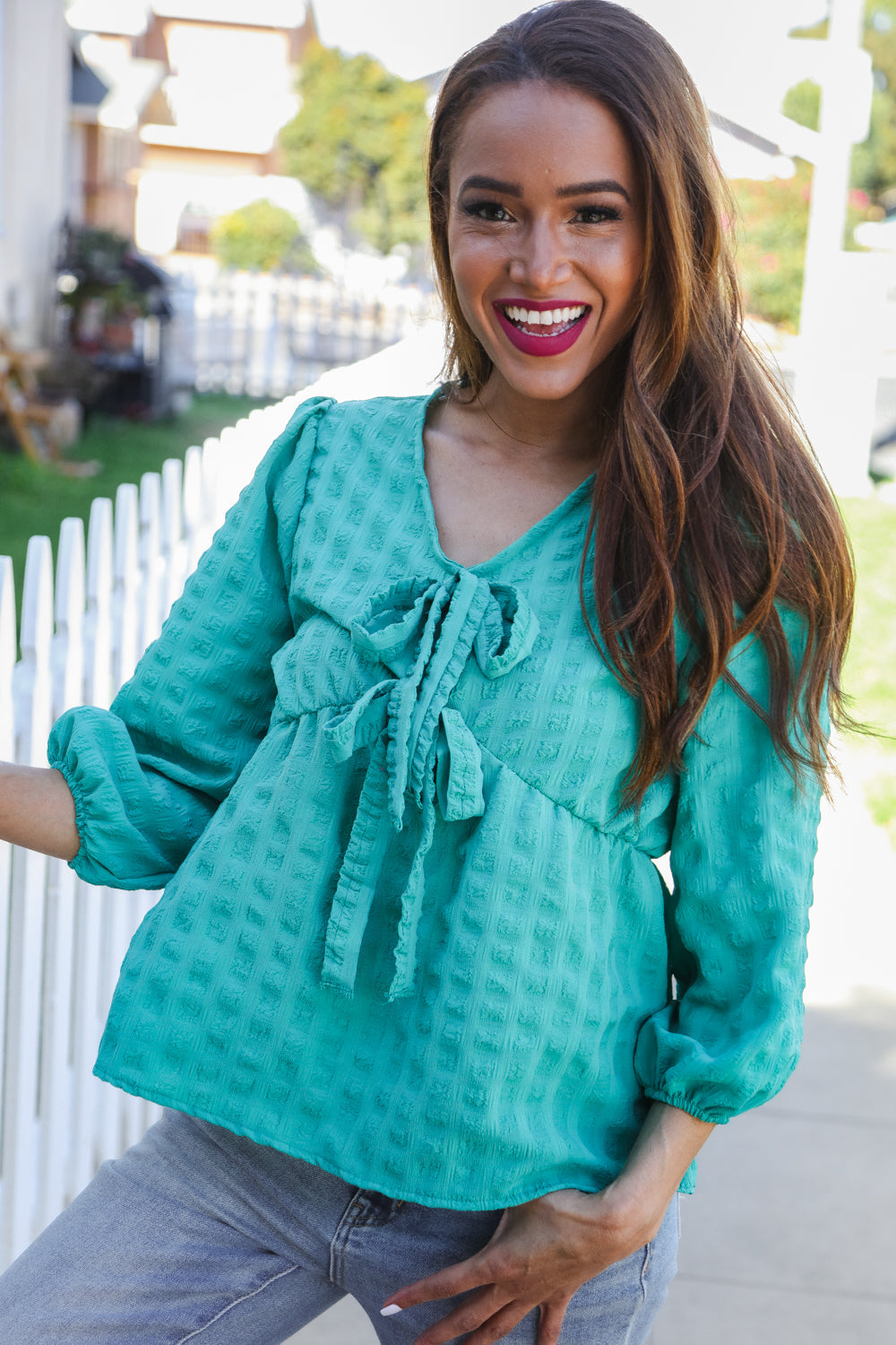 Tilly® | Mint woven babydoll blouse with bow and V-neck