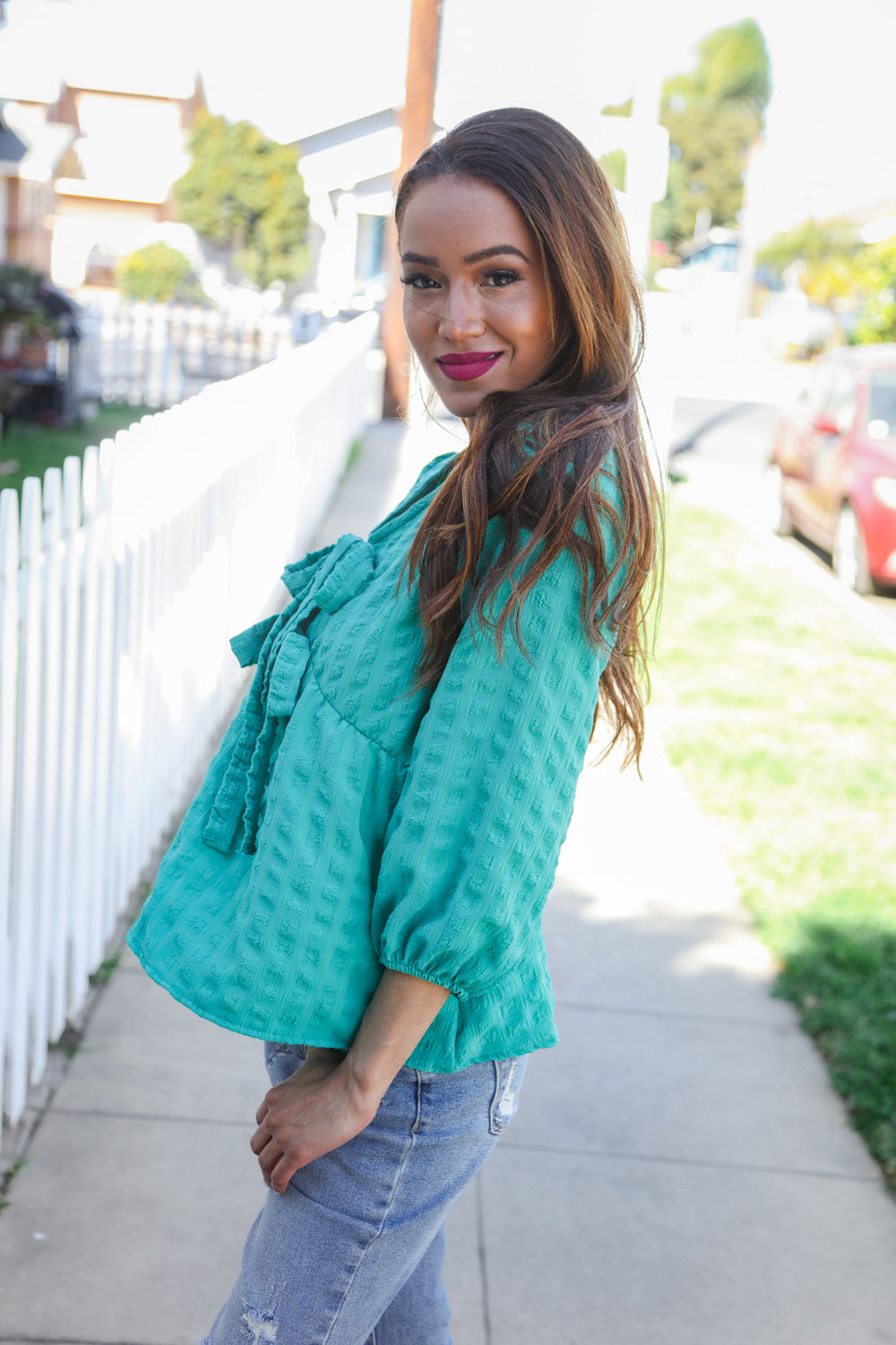 Tilly® | Mint woven babydoll blouse with bow and V-neck