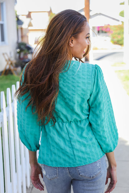 Tilly® | Mint woven babydoll blouse with bow and V-neck