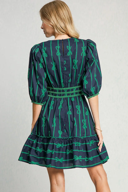 Sybil® | Stylish dress with green bow pattern