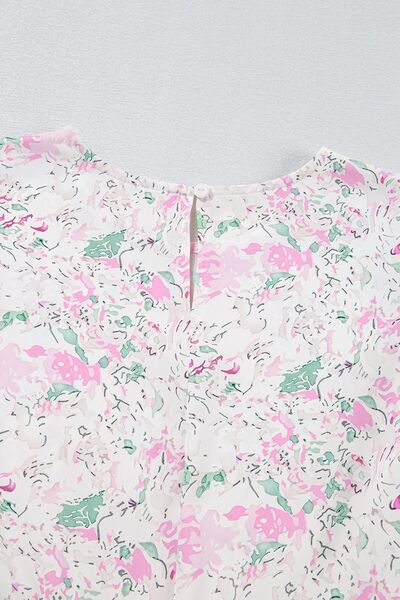 Zara® | Printed long-sleeved blouse with a round neckline