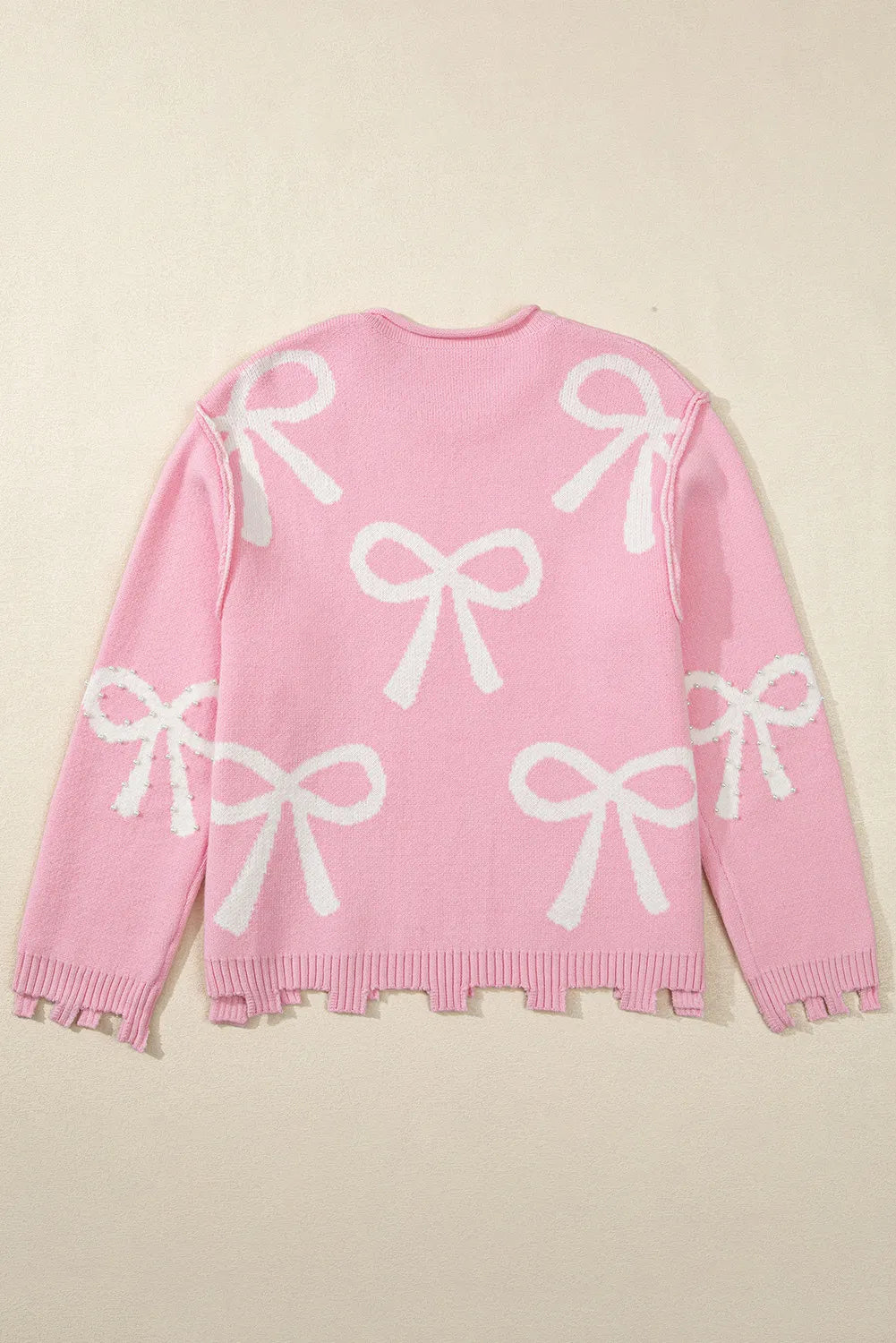 Yessica® | Long-sleeved crew neck sweater with pearl detail and bow