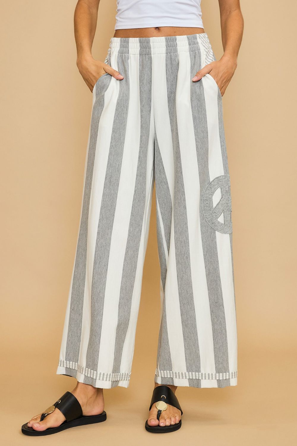 Vittoria® | Striped wide-leg pants with peace sign patch