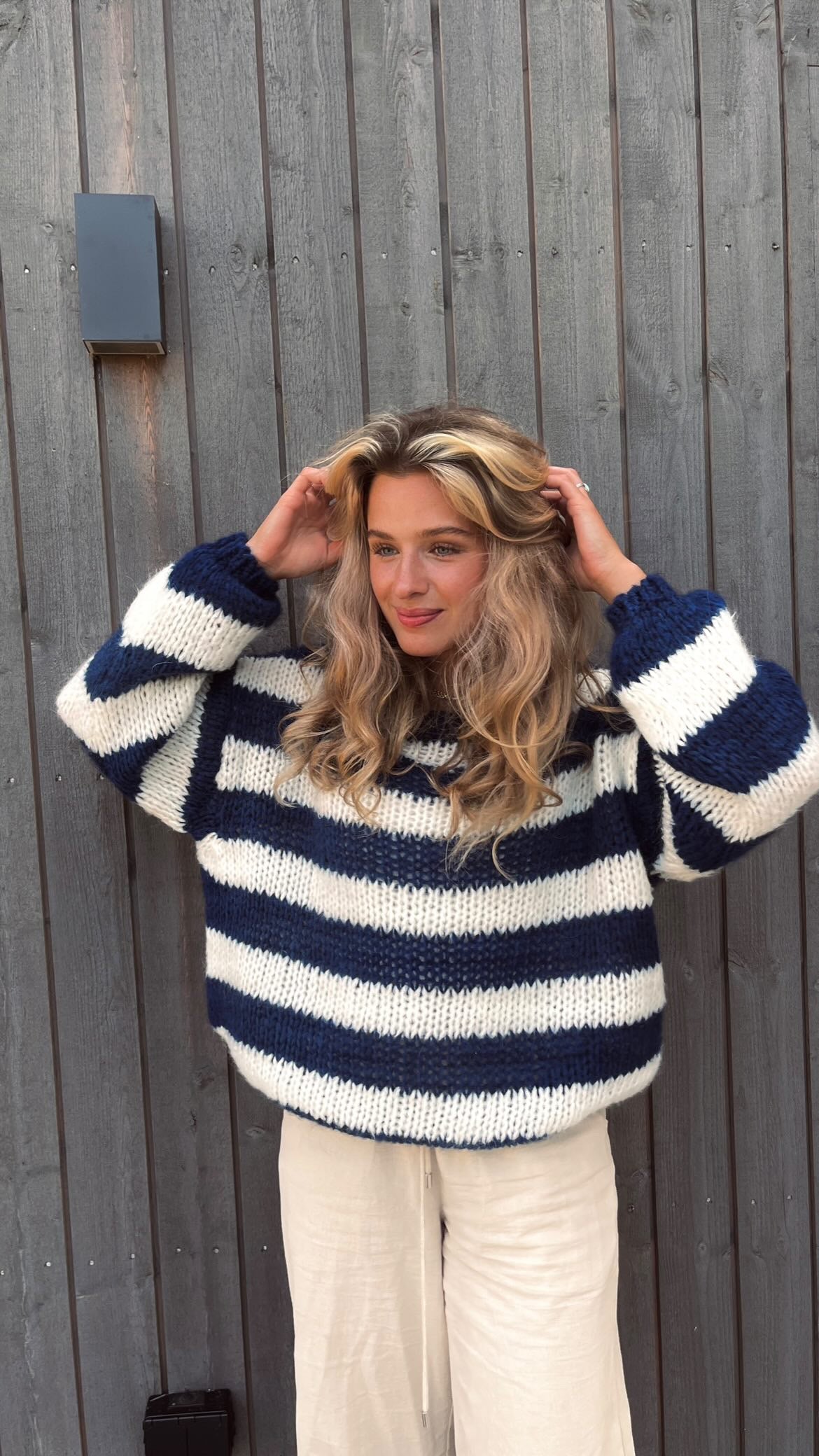 Zulema® | Striped loose sweater with a bateau neckline