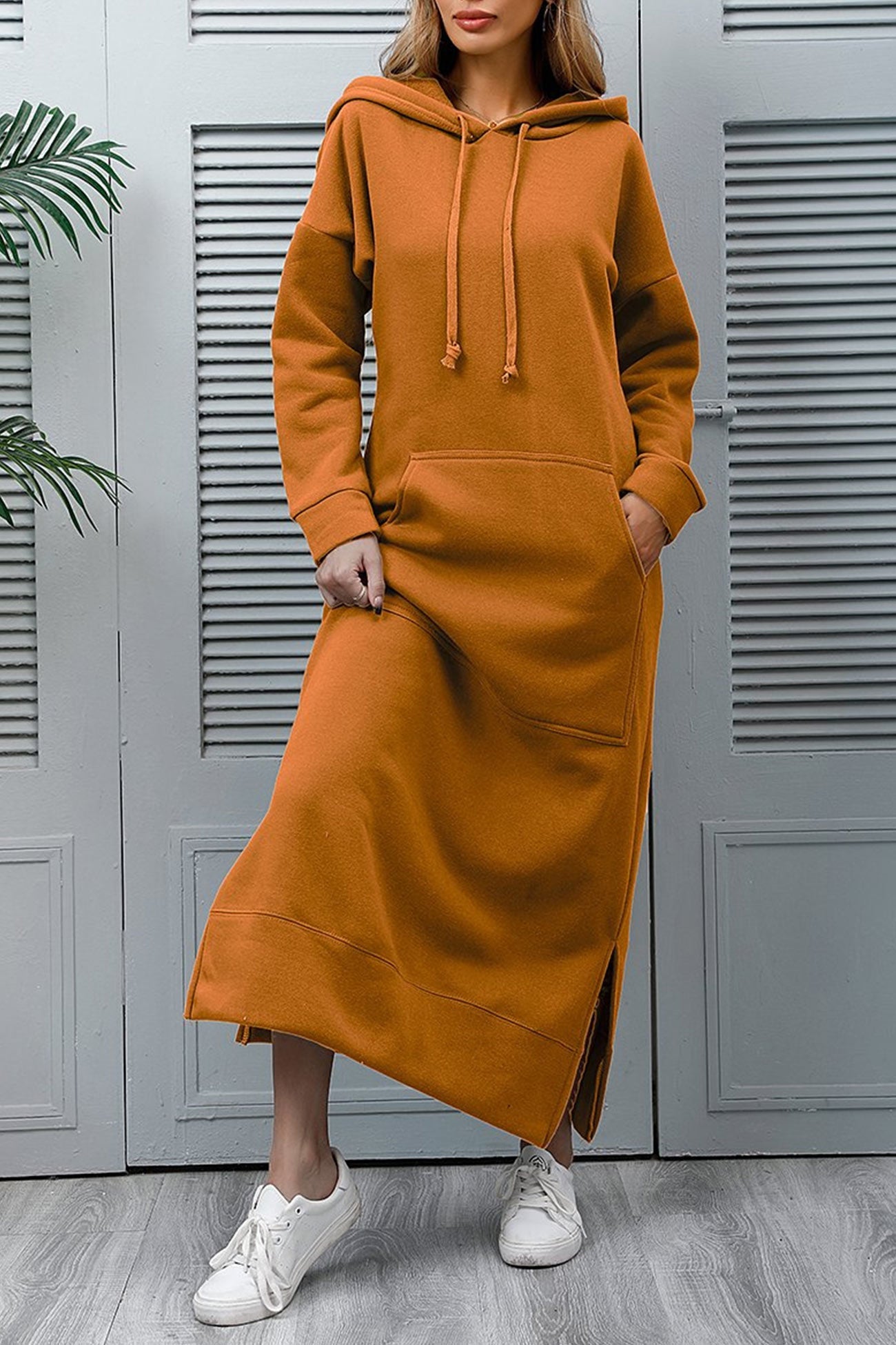 Nadia® | Solid hooded dress with pockets and a slit at the hem