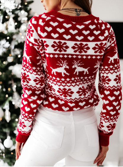 Yara® | Festive sweater with a reindeer and snowflake design.