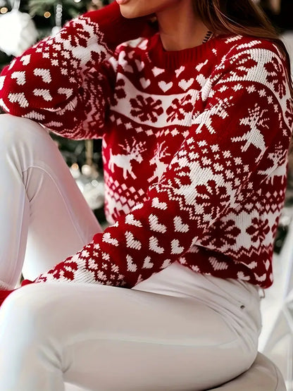 Yara® | Festive sweater with a reindeer and snowflake design.