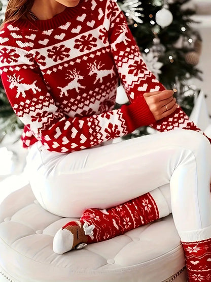 Yara® | Festive sweater with a reindeer and snowflake design.