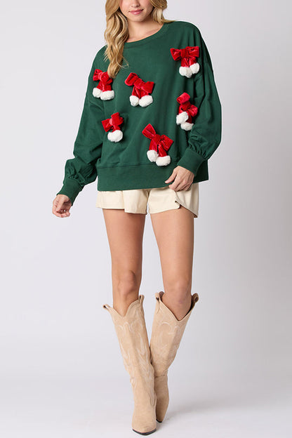 Victoria® | Casual long-sleeved sweatshirt with Christmas bow and decoration