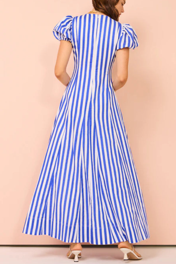 Zadie® | Treat yourself to a timeless wavy maxi dress with a stripe print, puff sleeves and pockets