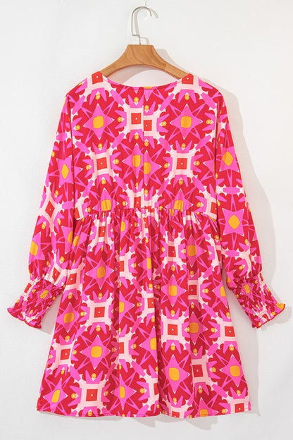 Paola® | Smocked, long-sleeved mini dress with a geometric print