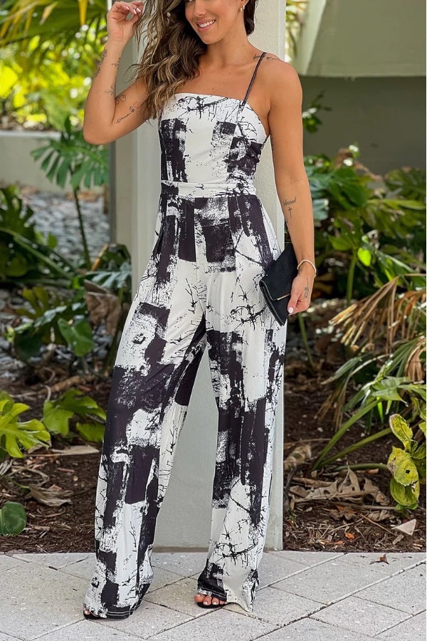 Natividad® | Black and white printed jumpsuit with a cross back