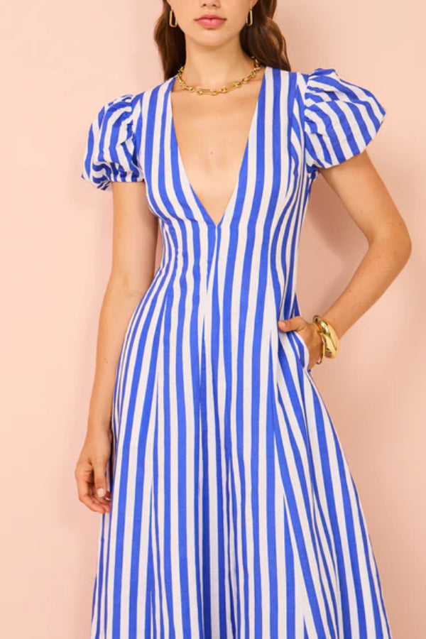 Zadie® | Treat yourself to a timeless wavy maxi dress with a stripe print, puff sleeves and pockets