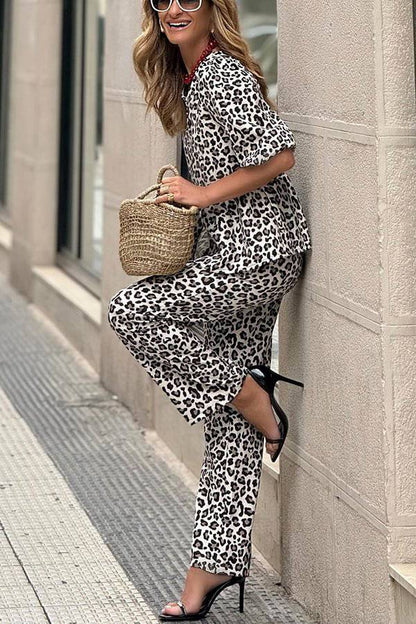 Queenie® | Enjoy the leopard print babydoll top, puff sleeves and pants set with elastic waistband and pockets every day